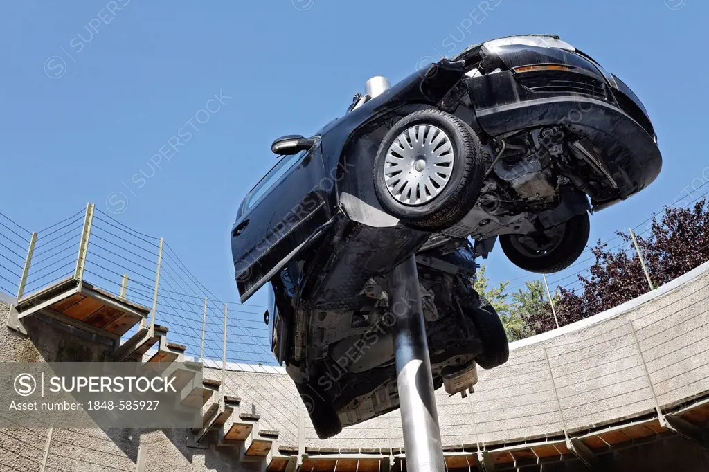 Demolished totalled car, impaled, sculpture Reaktor or reactor by Dirk Skreber, Skulpturenpark Koeln sculpture park, Cologne, North Rhine-Westphalia, ...