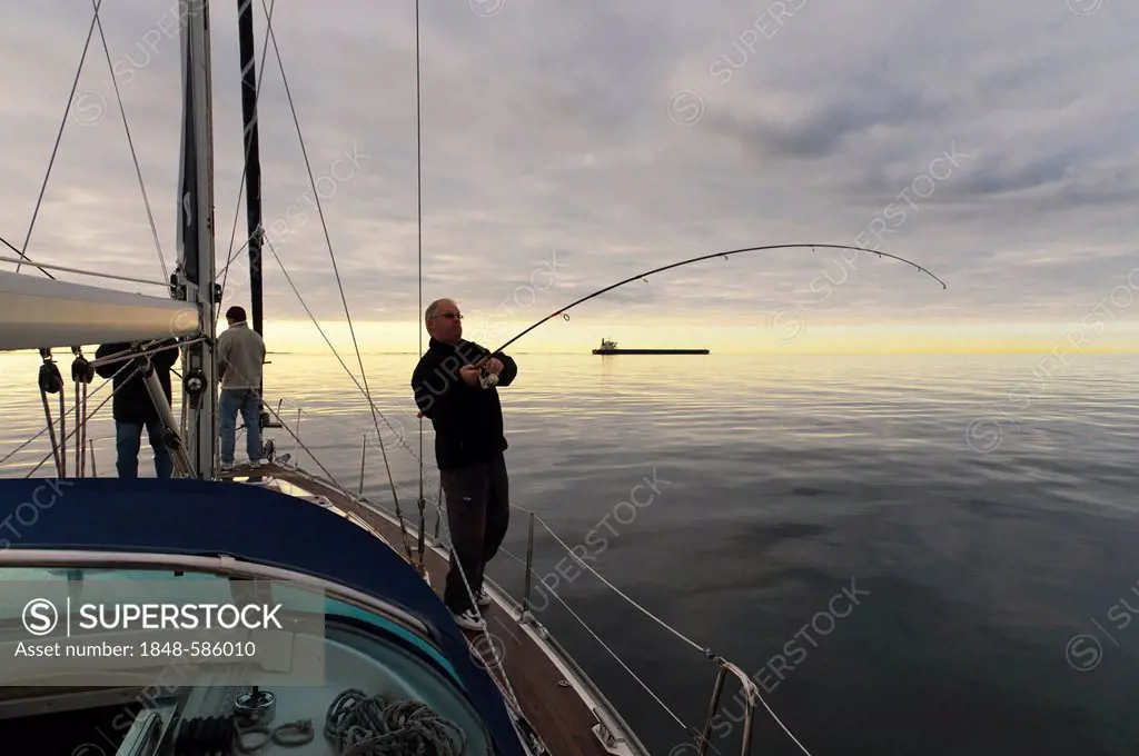 Deep sea fishing on the deck of a yacht