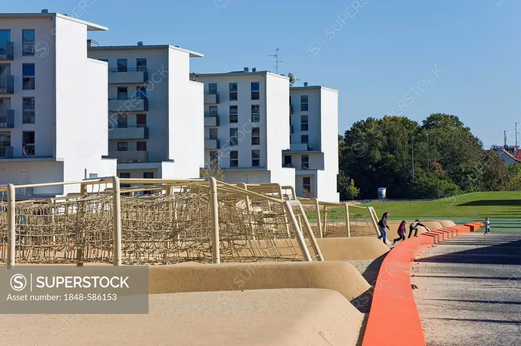 Social housing, climbing frame, children's playground, former fairgrounds, railroad cover, Westend, Munich, Bavaria, Germany, Europe