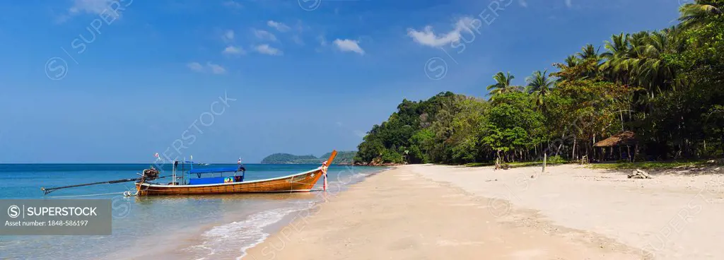 Long-tail boat on the sandy beach, Ao Si Beach, Ko Jum or Koh Pu island, Krabi, Thailand, Southeast Asia