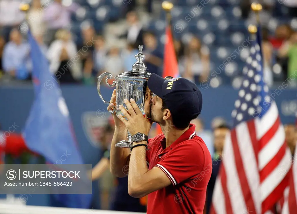 Awards ceremony, Novak Djokovic, SRB, winner of the men's final kissing his trophy, ITF Grand Slam tennis tournament, U.S. Open 2011, USTA Billie Jean...