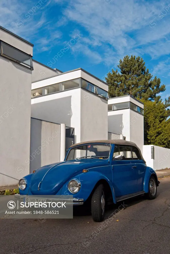 Blue VW Super Beetle 1302 in front of terraced houses by Jacobus Johannes Pieter Oud, at Weissenhofsiedlung, Weissenhof Estate, Stuttgart, Baden-Wuert...