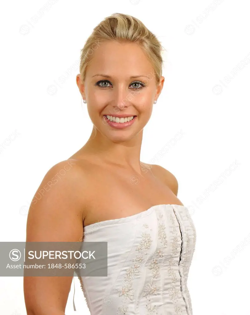 Young woman wearing a white strapless top, portrait
