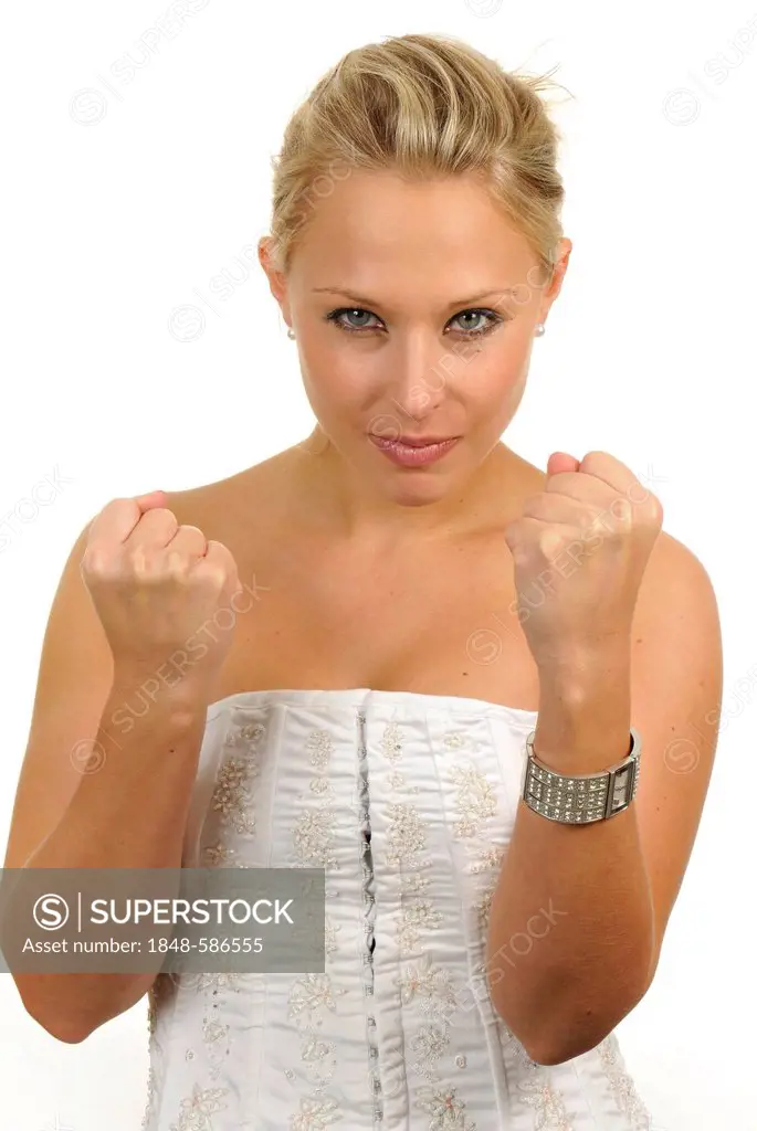 Young woman, angry, annoyed, clenched fists