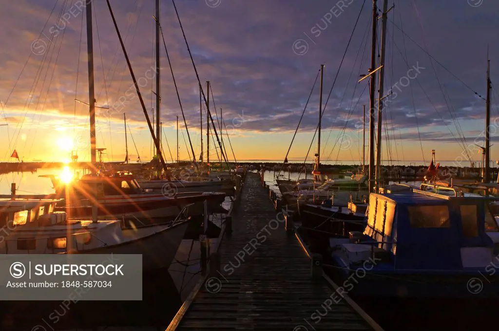 Sunrise over the yachts at the jetty, Spodsbjerg, Langeland, Denmark, Europe