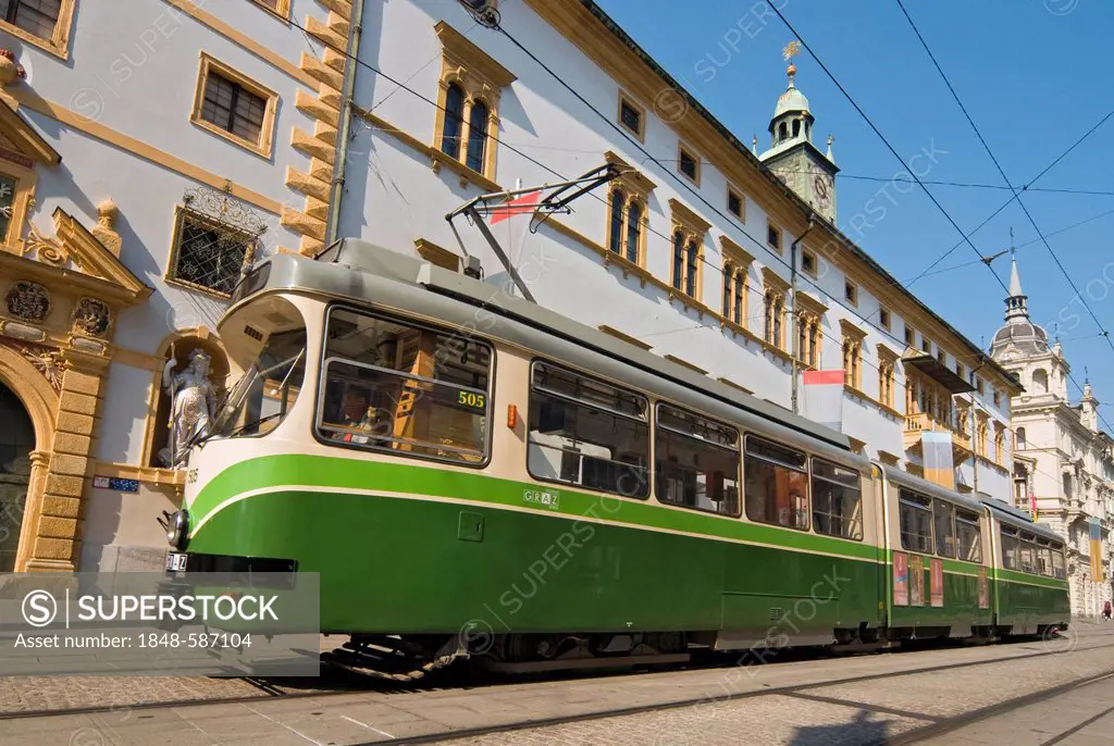 Tram outside Renaissance Landhaus parliament and Landeszeughaus armoury in Herrengasse street in Graz, Styria, Austria, Europe