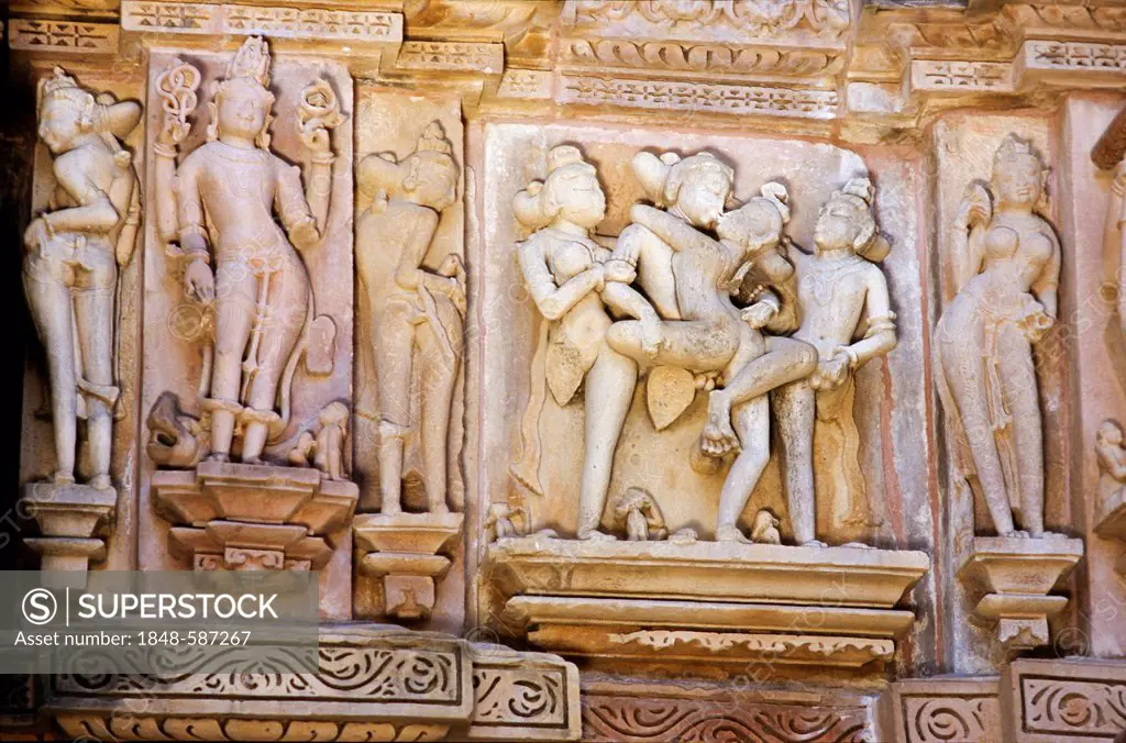 Stone carvings depicting scenes from the Kamasutra, Khajuraho temples, Khajuraho, Madhya Pradesh, India, Asia
