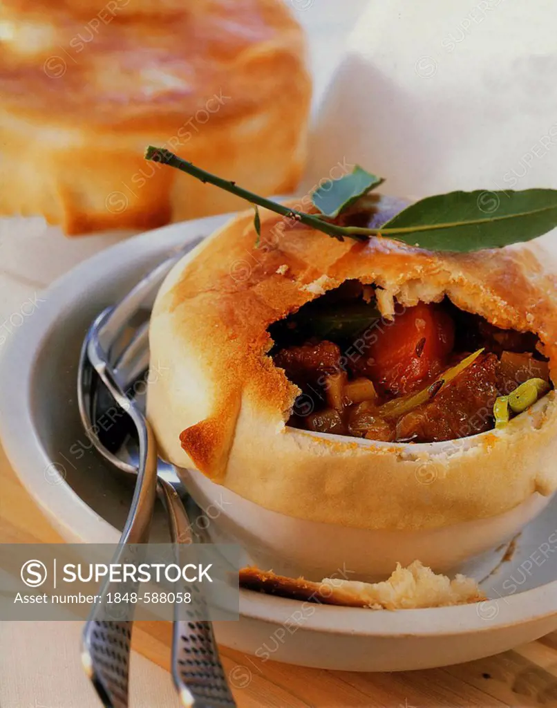 Pork ragout with pastry topping