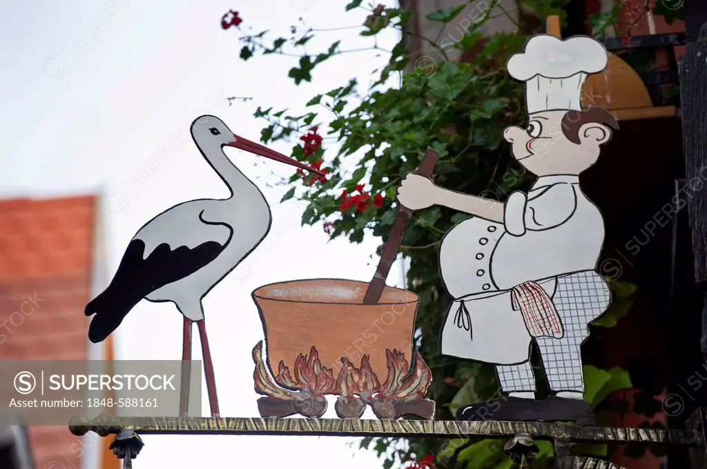 Storch and cook, restaurant sign in Riquewihr, Alsace, Vosges, France, Europe