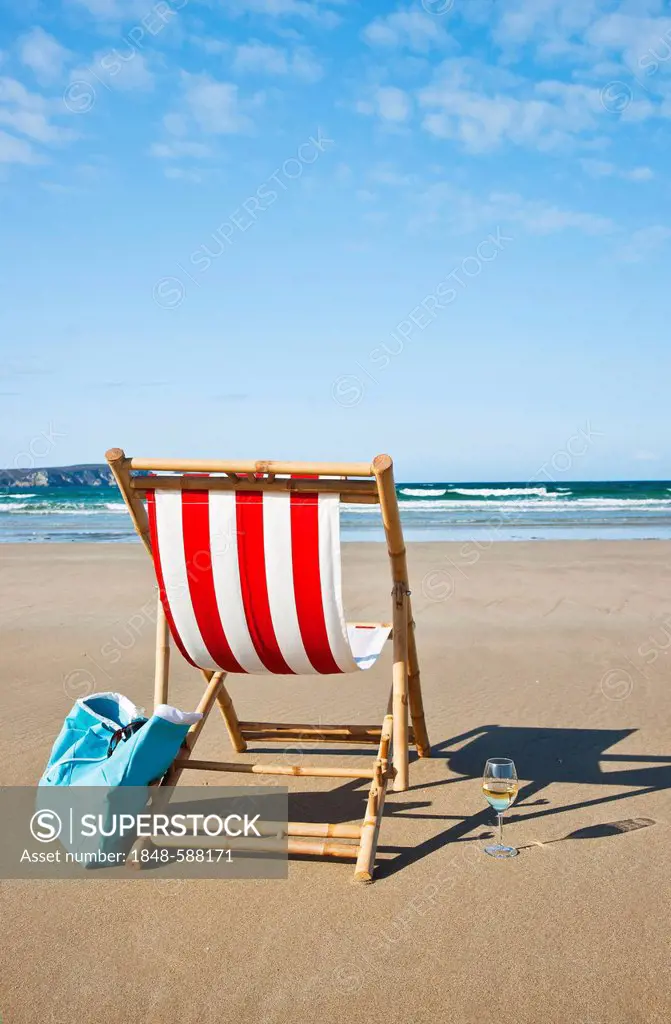 Empty deck chair on the beach, Camaret-sur-Mer, Finistere, Brittany, France, Europe