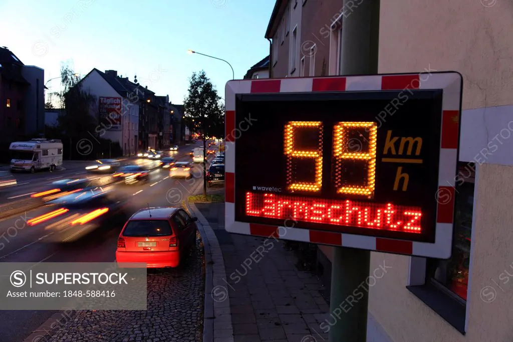 Road traffic noise, display panel displaying the speed of vehicles, if speed is in excess of 50 kph, the word Laermschutz, German for noise control is...