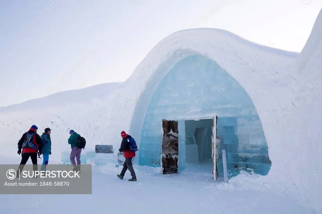 Visitors in front of the Icehotel in Jukkasjaervi, Lappland, North Sweden, Sweden