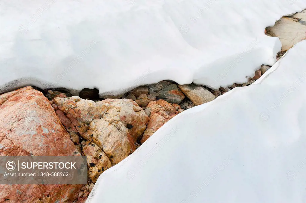 Snow, colourful rock, Mittivakkat Glacier, Ammassalik Island, East Greenland