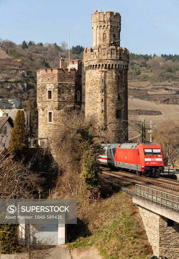 Intercity train passing the medieval fortifications at Oberwesel, Upper Middle Rhine Valley, UNESCO World Heritage Site, Rhineland-Palatinate, Germany...