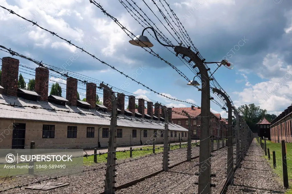 Barbed wire fence and barracks, Auschwitz I concentration camp, Auschwitz, Lesser Poland, Poland, Europe