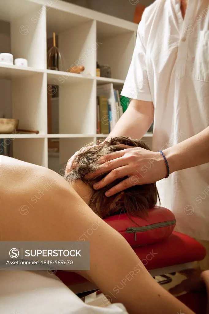 Patient getting a therapeutic massage, massage therapist