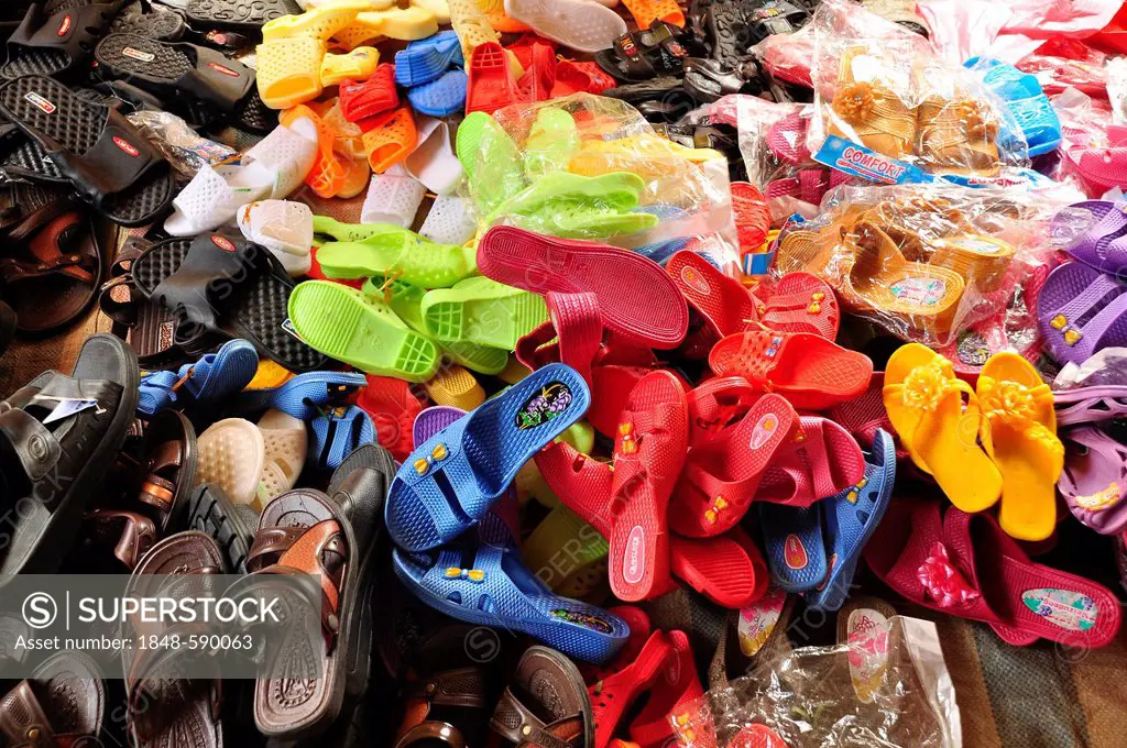 Colourful plastic sandals for sale at a market, Can Cau, Northern Vietnam, Vietnam, Southeast Asia, Asia