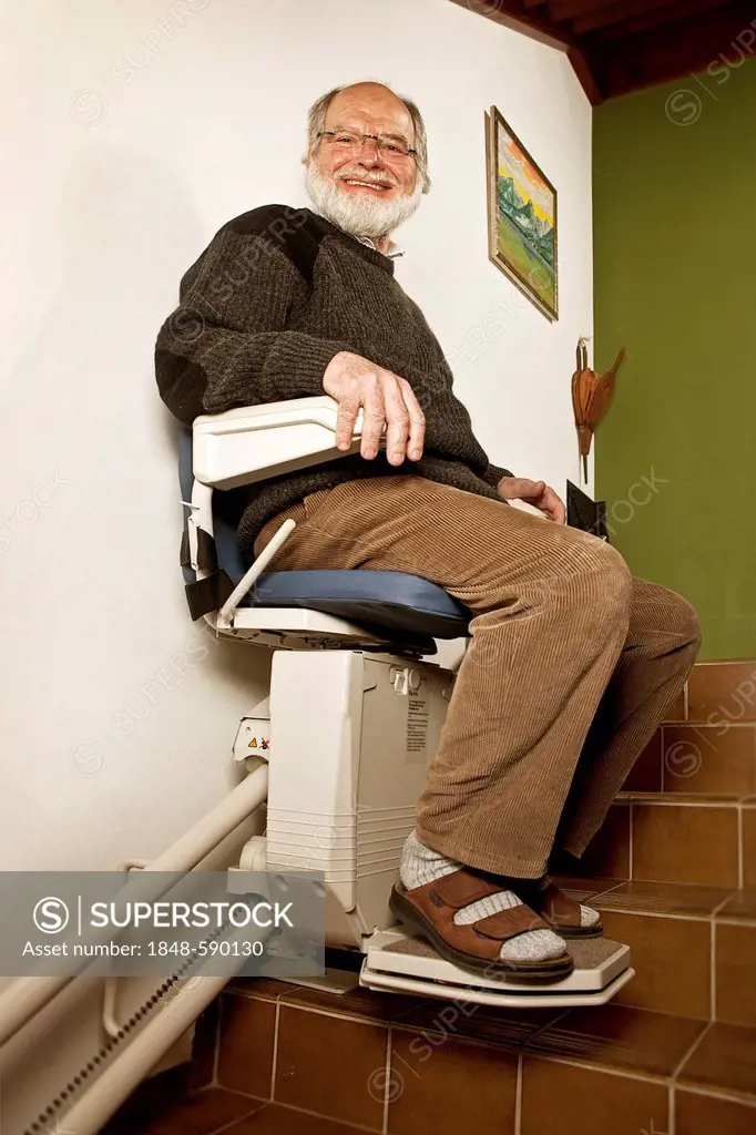 Senior sitting on a stairlift