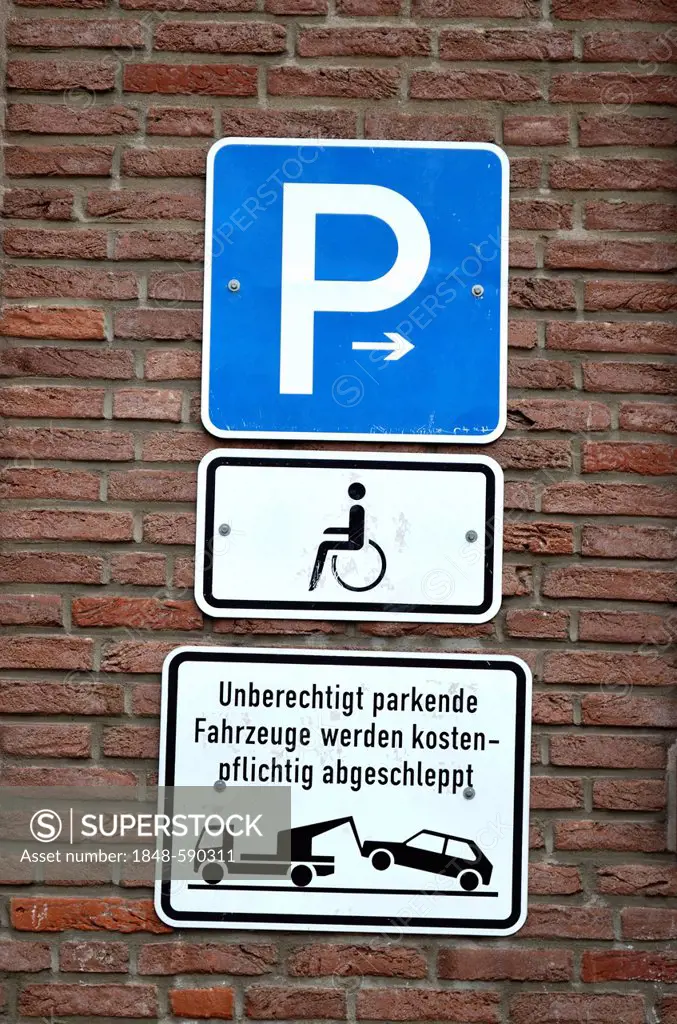 Several parking signs on a wall, historic town centre, Duesseldorf, North Rhine-Westphalia, Germany, Europe