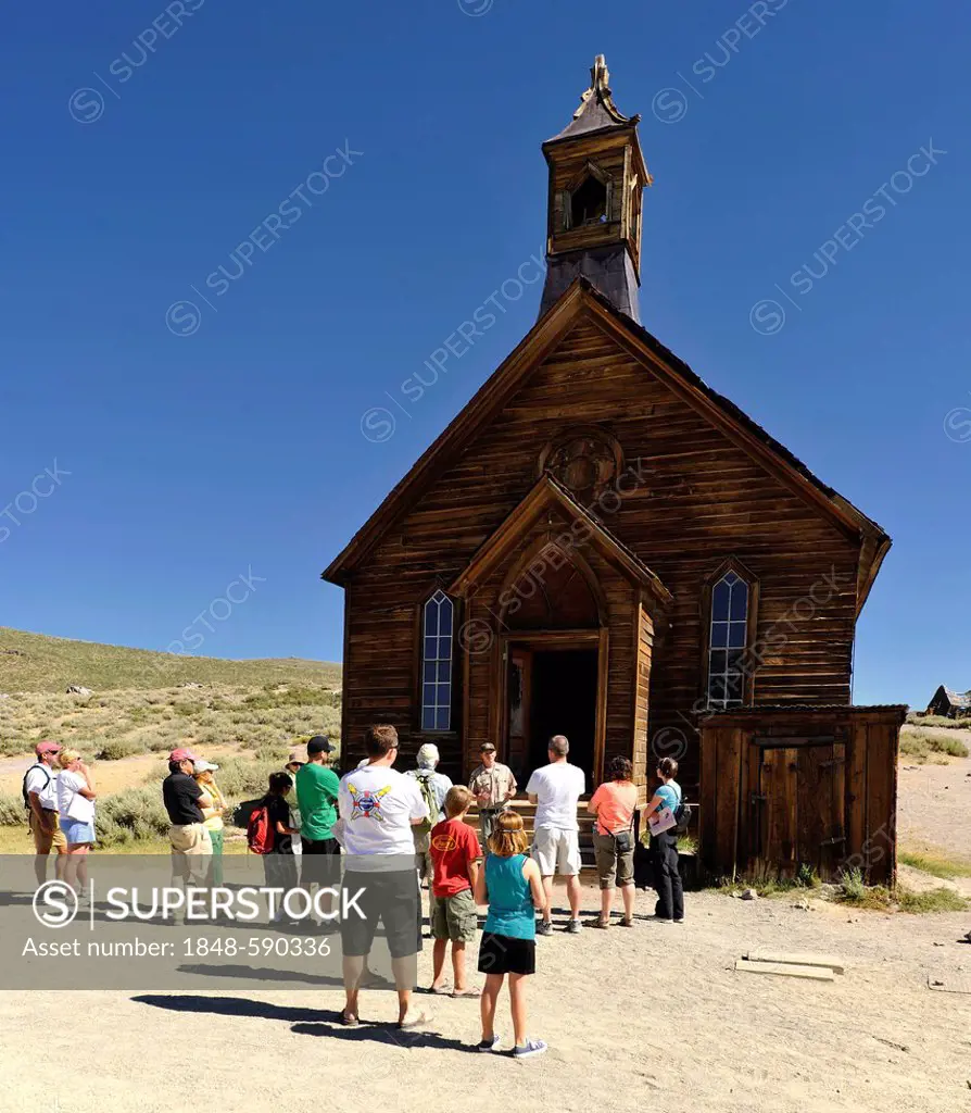 Ranger as a guide for tourists, Methodist Church, ghost town of Bodie, a former gold mining town, Bodie State Historic Park, California, United States...