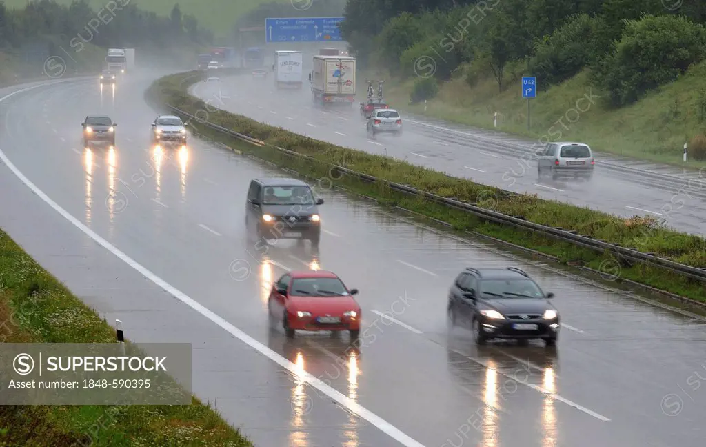 Traffic in rainy weather on Autobahn 4 motorway near Frankenberg, Saxony, Germany, Europe