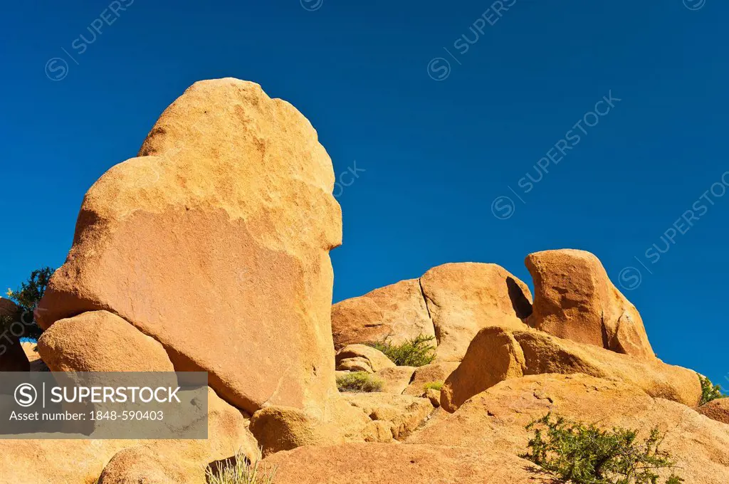 Granite boulders lying on a rocky outcrop in the Anti-Atlas Mountains, southern Morocco, Morocco, Africa