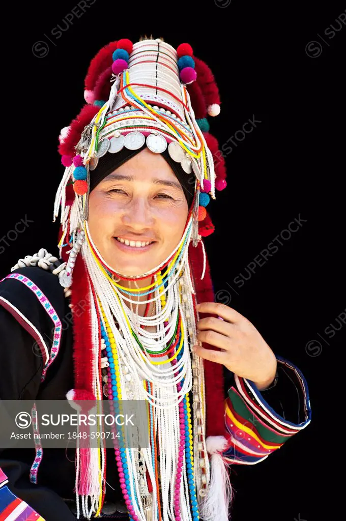 Akha woman wearing a traditiona UloAkha costume in Chiang Rai, Thailand, Asia