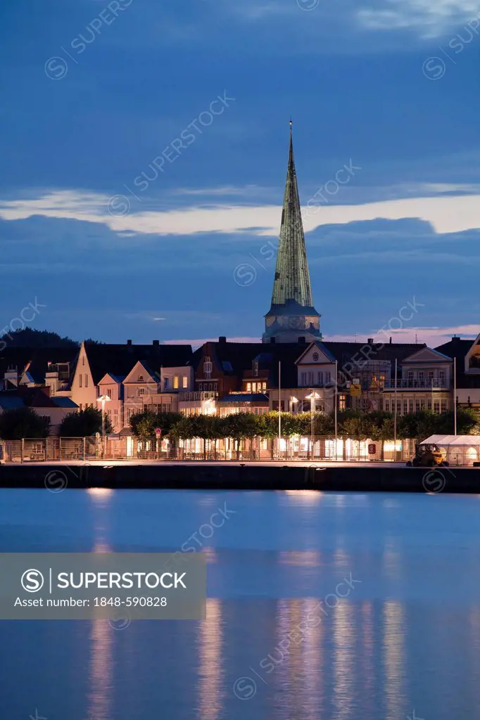 Vorderreihe, front row of buildings with St. Lawrence Church, night, blue hour, Baltic coastal resort of Travemuende, Luebeck Bay, Schleswig-Holstein,...