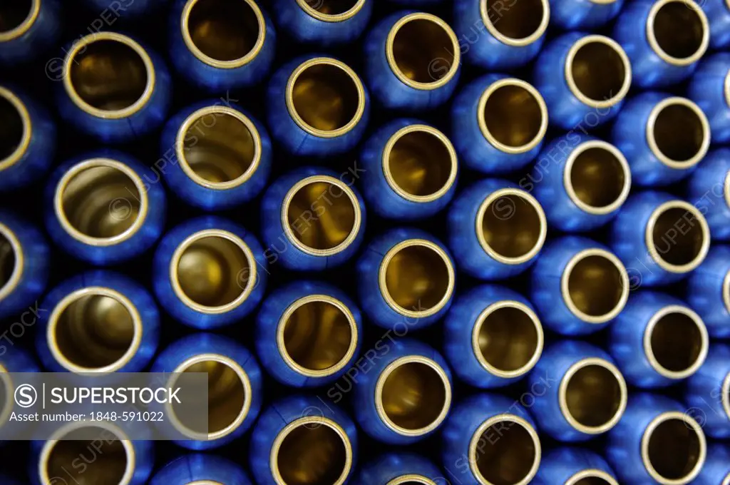 Empty aluminum bottles before being filled with deodorant, German cosmetics manufacturer