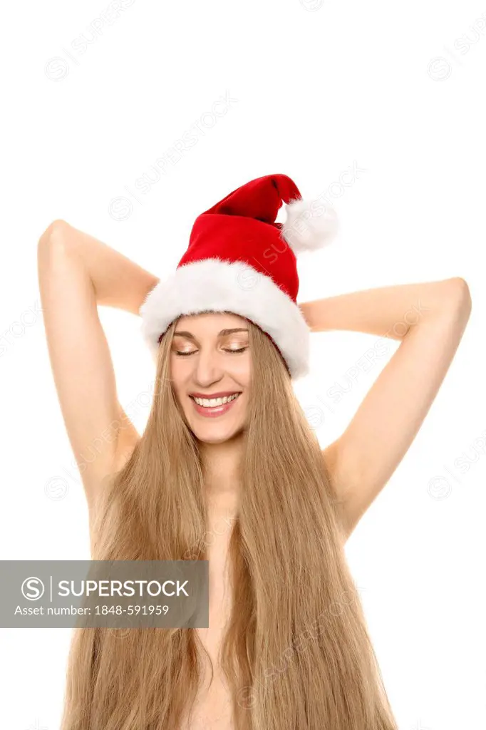 Woman wearing a Santa Claus hat with long hair covering her naked torso