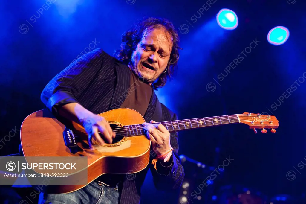 Jean-Pierre von Dach, guitarist for the Swiss singer and songwriter Manuel Albertin, aka Nuel, performing live in the Schueuer concert hall, Lucerne, ...