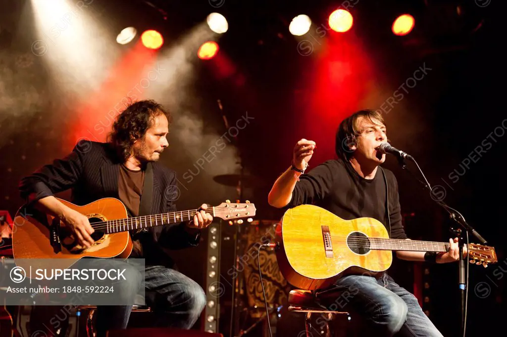 Guitarist Jean-Pierre von Dach and the the Swiss singer and songwriter Manuel Albertin, aka Nuel, performing live in the Schueuer concert hall, Lucern...