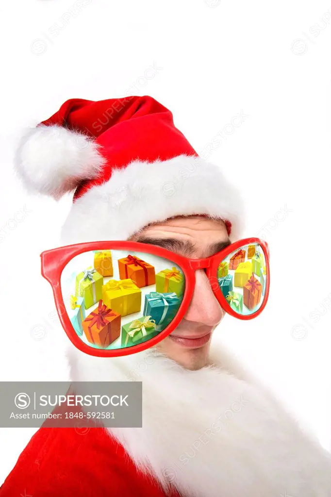 Man dressed as Santa Claus wearing oversized novelty glasses