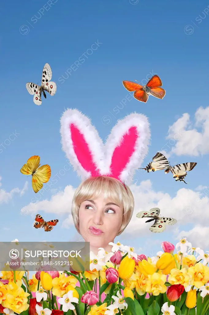 Woman wearing bunny ears, flower field, butterflies