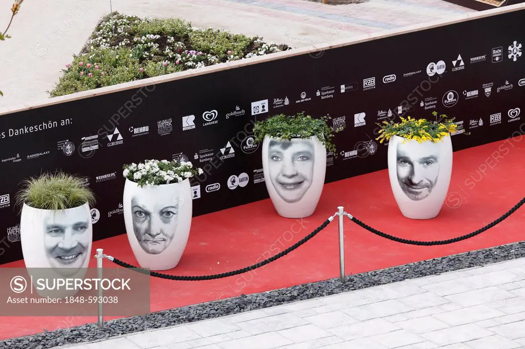 Flower pots with celebrity faces, VIP Garden, Bavarian horticultural show 2012 in Bamberg, Upper Franconia, Franconia, Bavaria, Germany, Europe