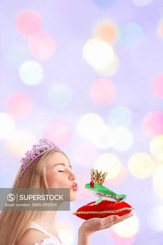 Woman kissing a frog prince