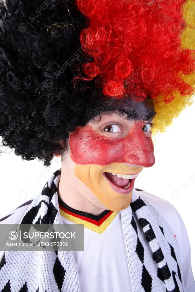 Football fan with their face painted and wearing a wig in the German national colours