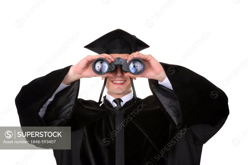 Student wearing a graduation cap looking through a pair of binoculars