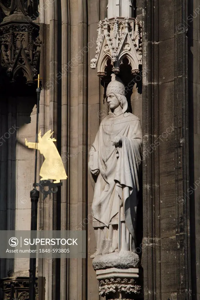 Statue of a saint on Cologne Cathedral, Cologne, North Rhine-Westphalia, Germany, Europe