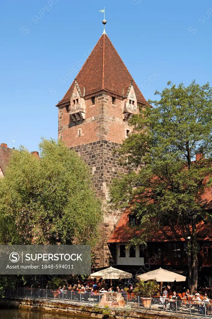 Schuldturm, medieval tower, 1323, with Celona Finca bar and café at front on the banks of the Pregnitz river, Vordere Insel Schuett, Nuremberg, Middle...
