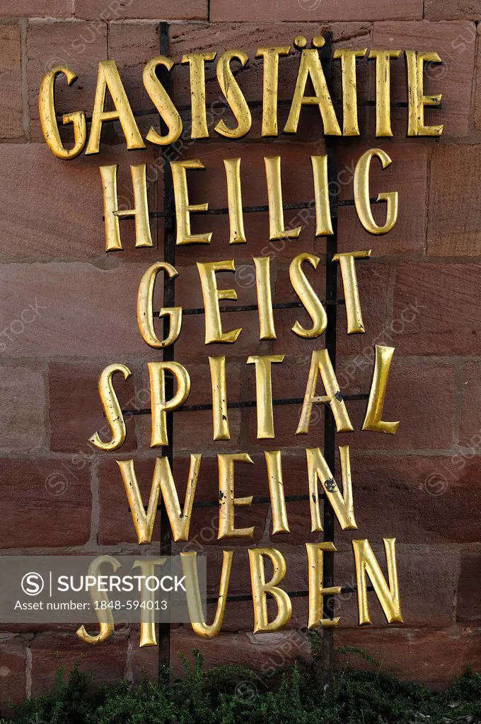 Gold-coloured lettering outside the Heiliggeist Spital Weinstuben restaurant, Spitalgasse 16, Nuremberg, Middle Franconia, Bavaria, Germany, Europe