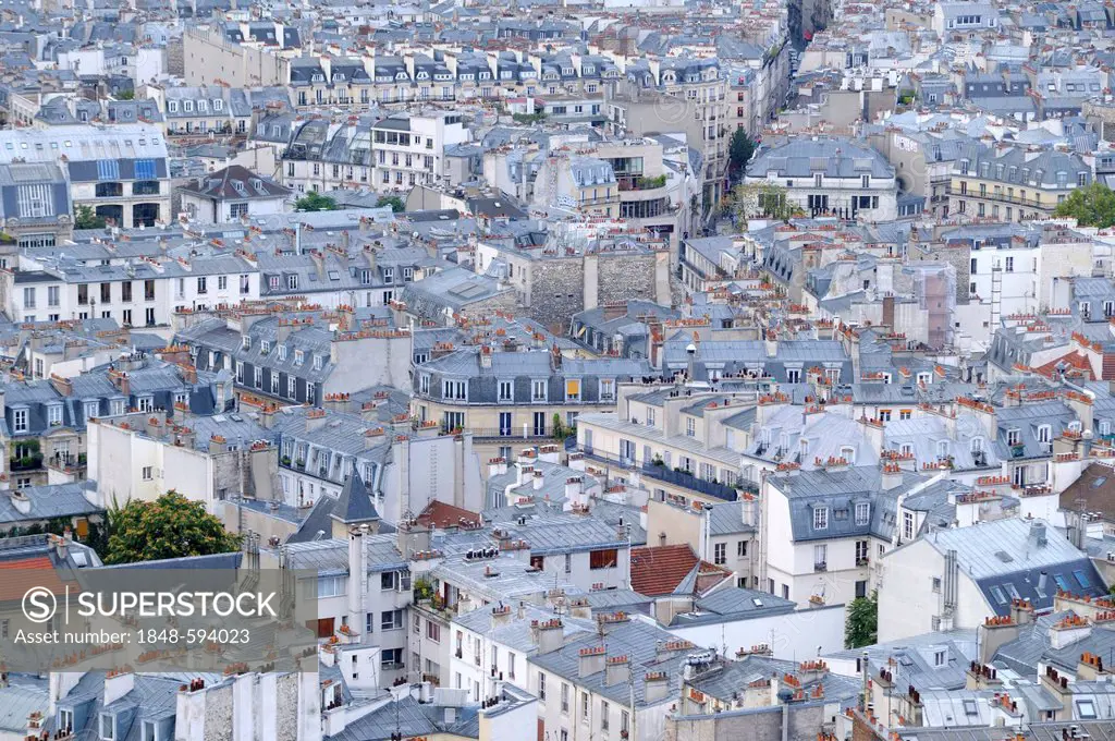 Overlooking the roofs of Paris from Basilique du Sacré-Cur, Basilica of the Sacred Heart of Paris, Paris, France, Europe