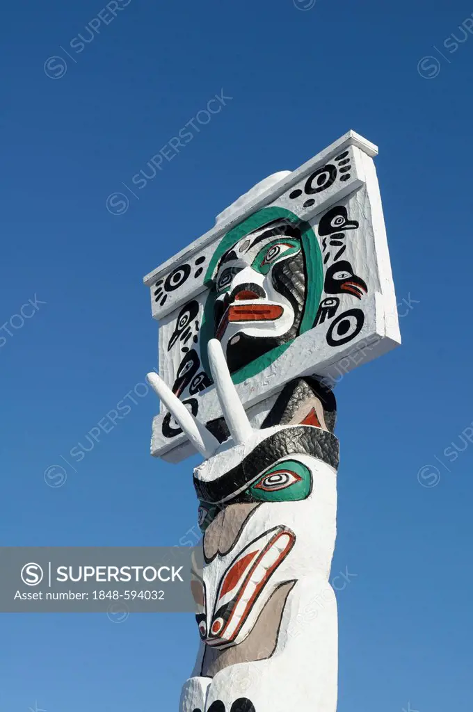 Moon with Human Spirit Face above Mountain Goat above Bear Holding Royal totem by Simon Charlie, Duncan, Vancouver Island, British Columbia, Canada