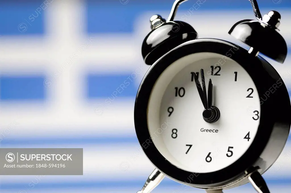 Five to twelve on an alarm clock display in front of Greek national flag, symbolic image, threat of impending national bankruptcy of Greece