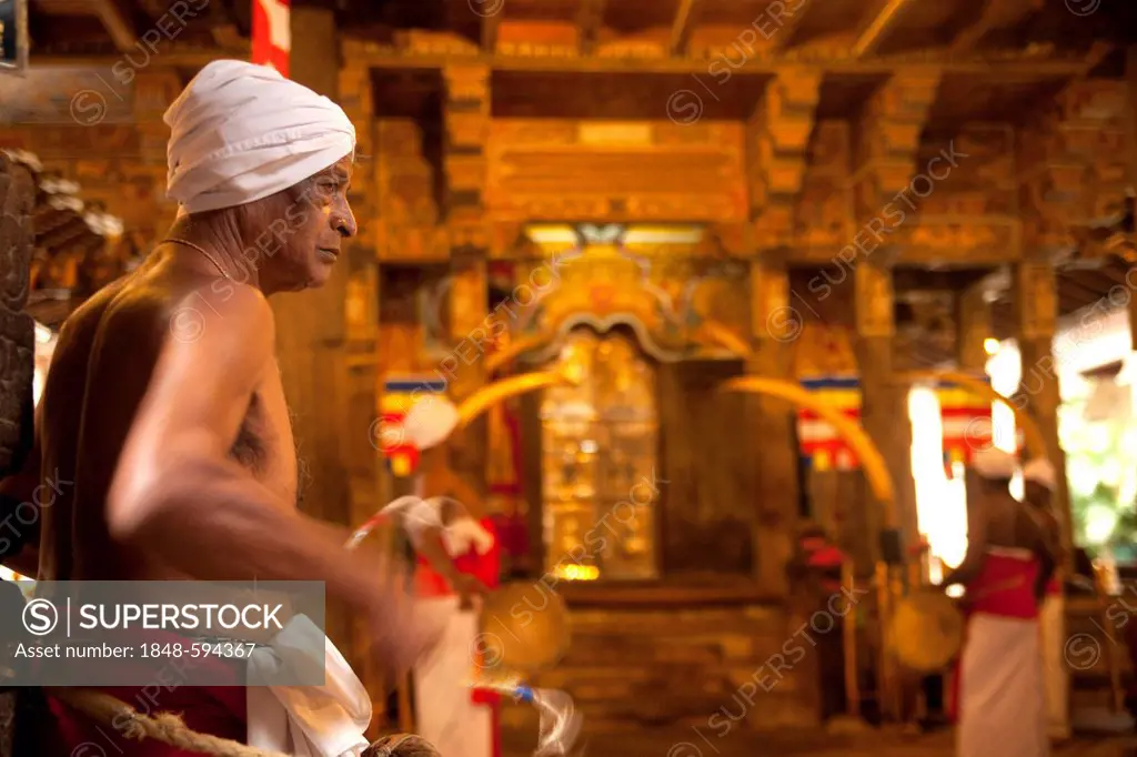 Drummers during a ceremony at the Temple of the Tooth, also known as Sri Dalada Maligawa, Kandy, Sri Lanka, Indian Ocean