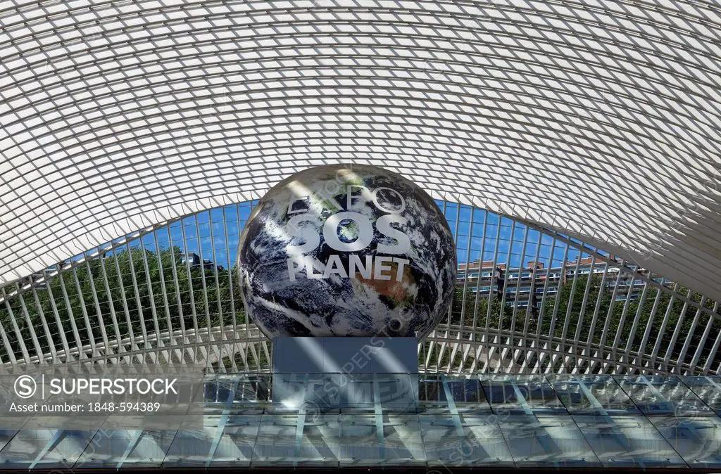 Entrance of the station concourse, a globe with the inscription EXPO SOS Planet as a reference to the candidacy of Liege for the World's Fair 2017, Ga...
