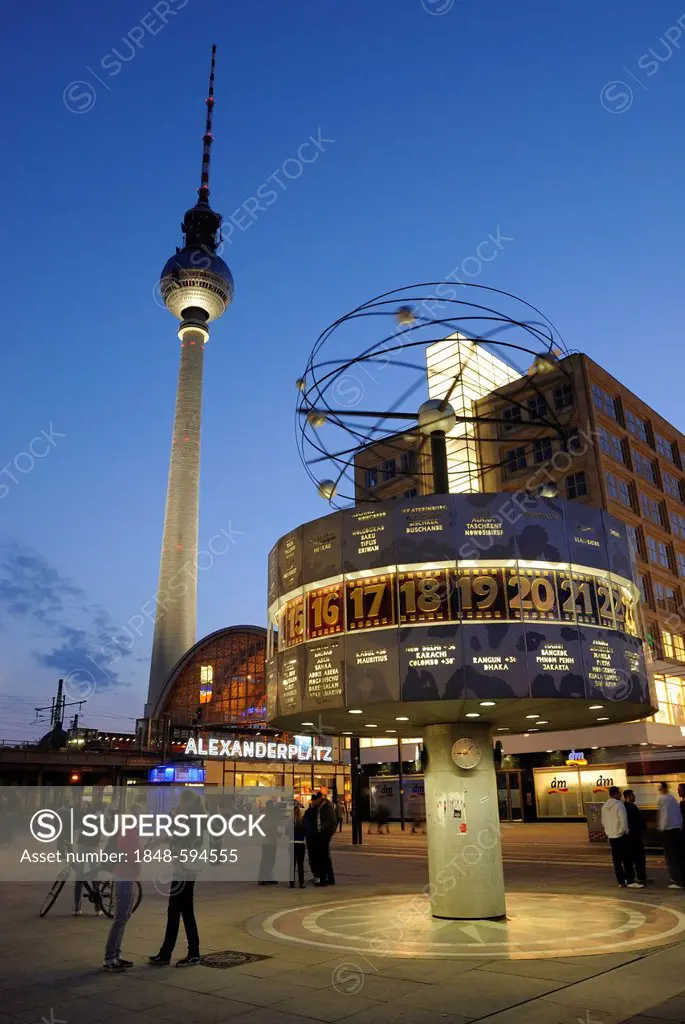 Alexanderplatz square with world clock, Alexanderplatz station and TV tower at dusk, Mitte district, Berlin, Germany, Europe