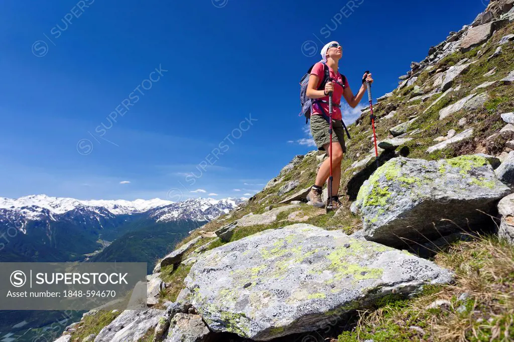 Climber ascening to the Vermoispitze peak above Latsch, Vinschgau, behind the Ortler area, South Tyrol, Italy, Europe