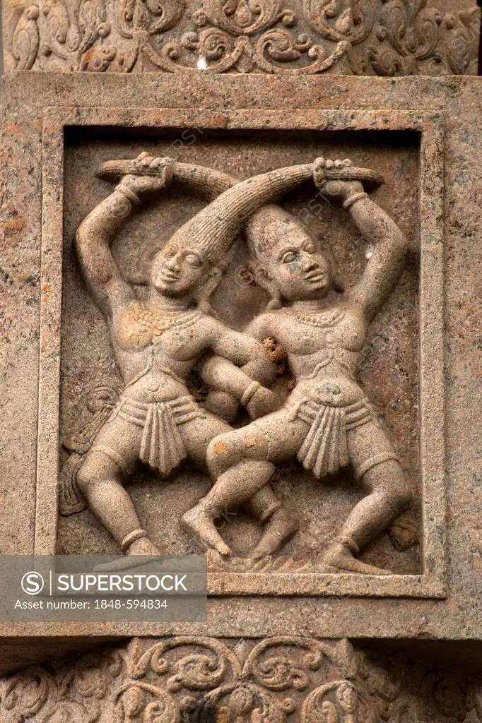 Stone carving of dancing figures on the Temple of the Tooth, also known as Sri Dalada Maligawa, Kandy, Sri Lanka, Indian Ocean