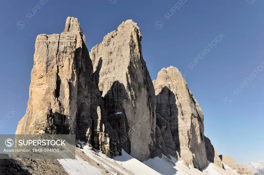 Tre Cime di Lavaredo or Drei Zinnen peaks in Alta Pusteria, as seen from Dreizinnenhuette alpine hut, Sesto, Sexten Dolomites, South Tyrol, Italy, Eur...